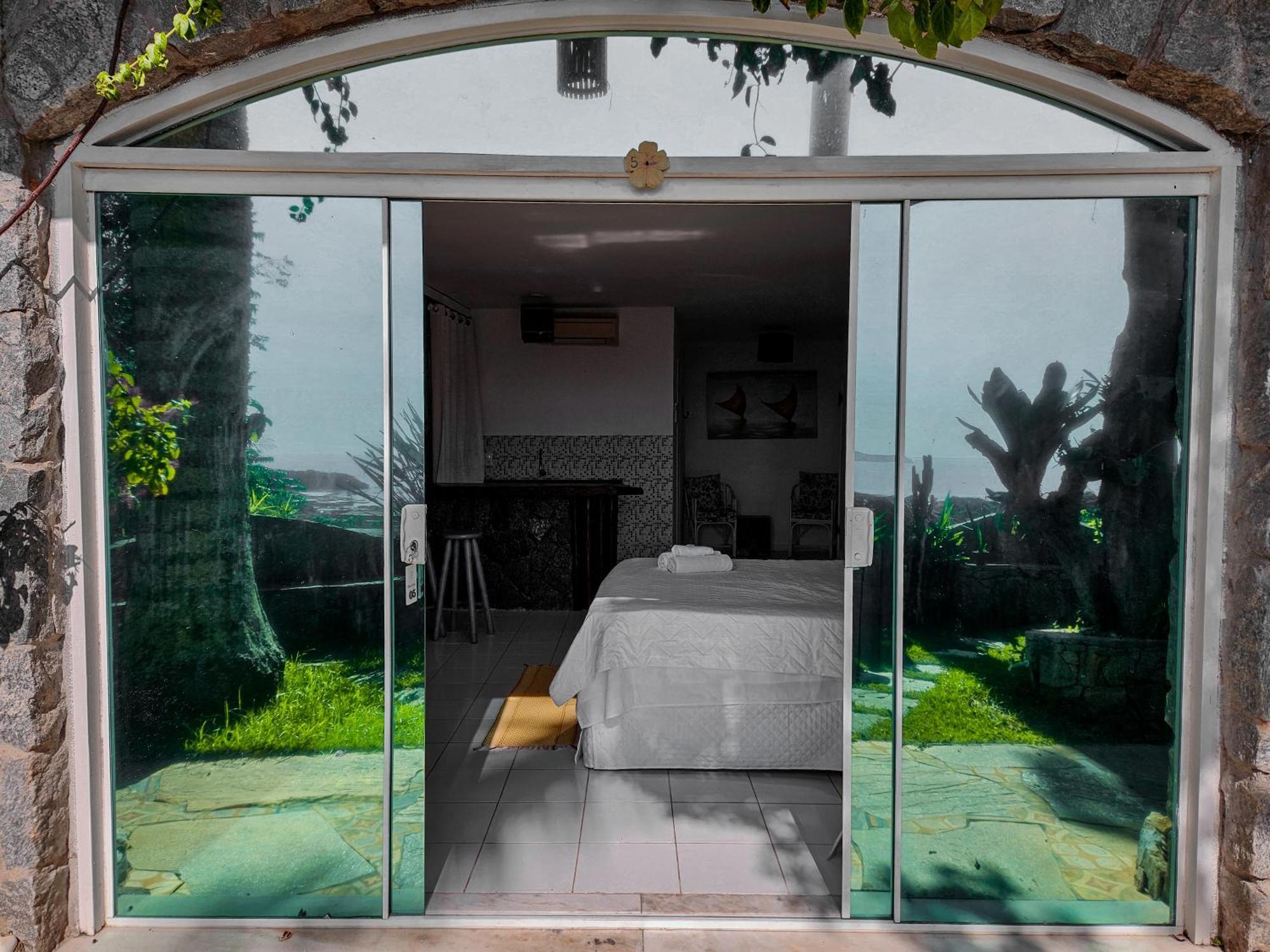 Bliss Hotéis Bella Vista Búzios Exterior foto Sliding doors