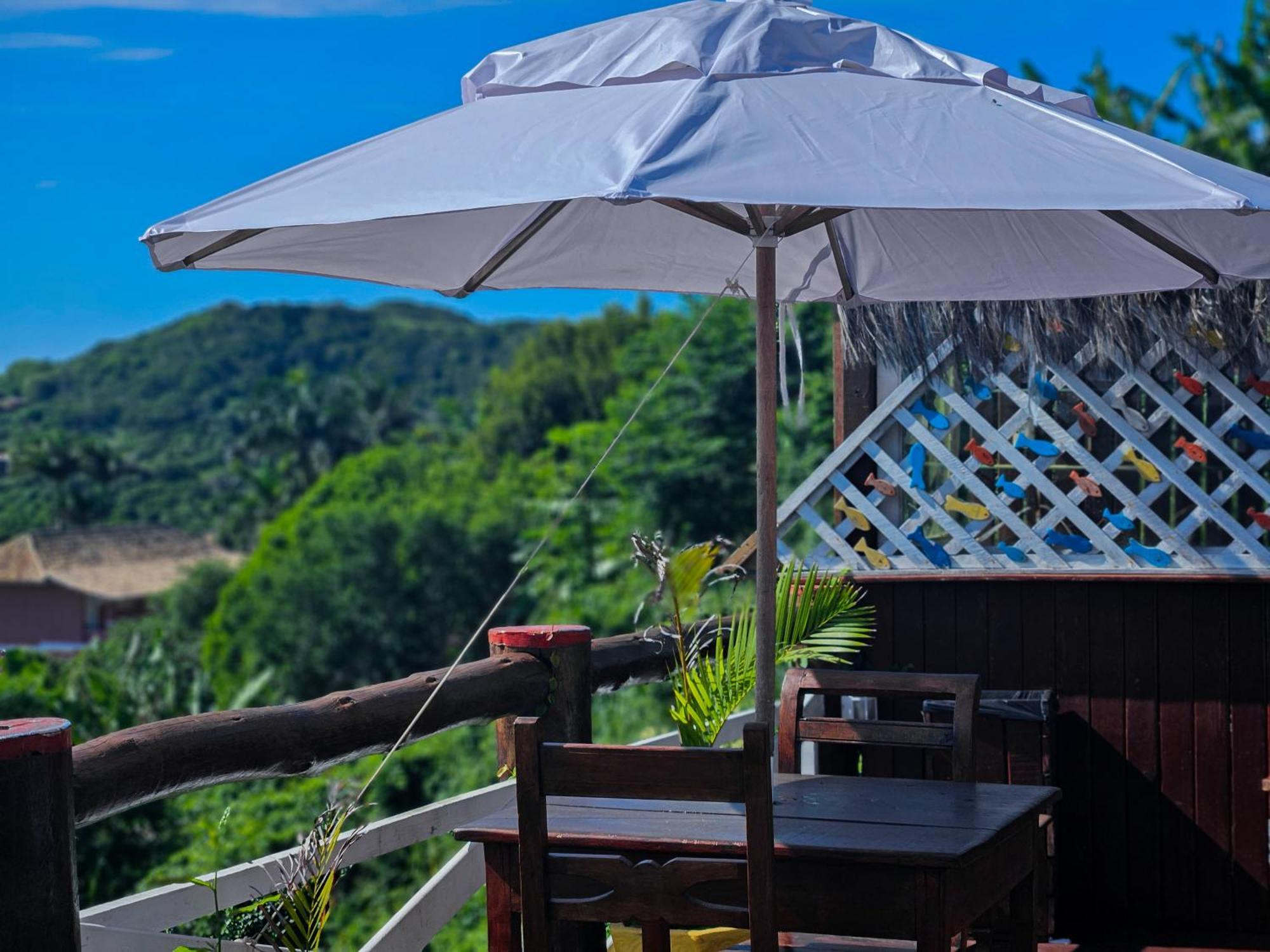 Bliss Hotéis Bella Vista Búzios Exterior foto A patio umbrella