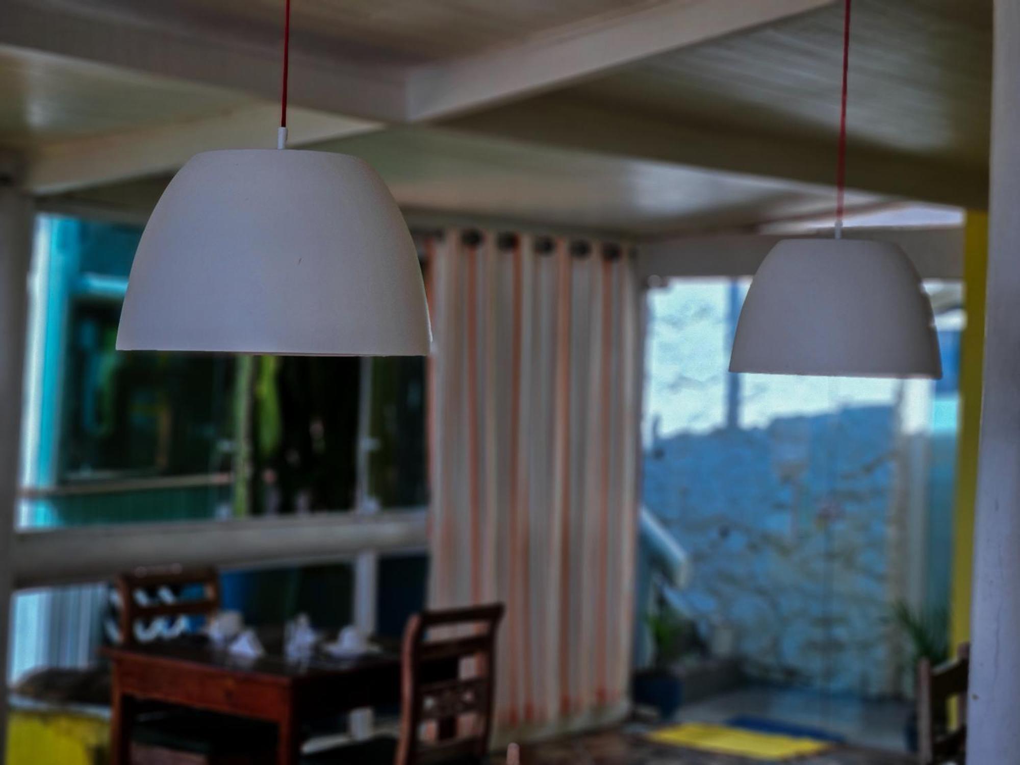 Bliss Hotéis Bella Vista Búzios Exterior foto A pair of pendant lights
